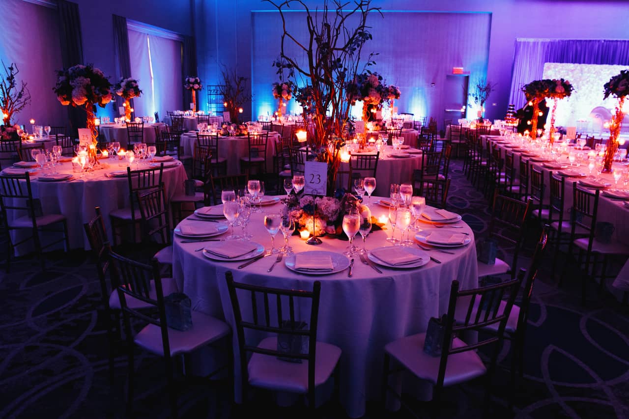 Wedding Banquet hall with candles and round tables